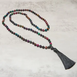 Tiger eye beaded mala prayer necklace close-up detail showing 8mm bead size red brown stones and black tassel fastener