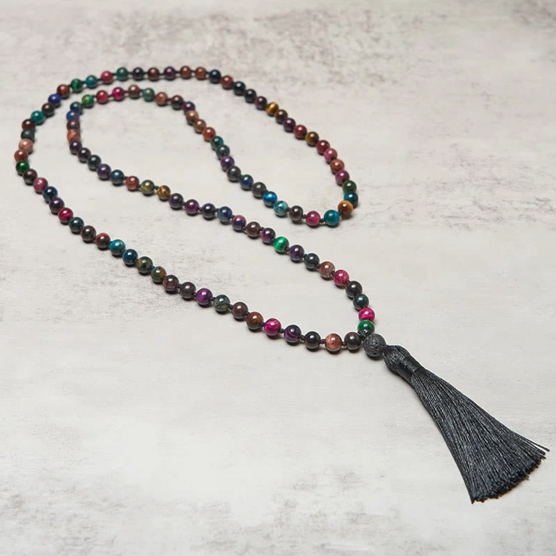 Tiger eye beaded mala prayer necklace close-up detail showing 8mm bead size red brown stones and black tassel fastener