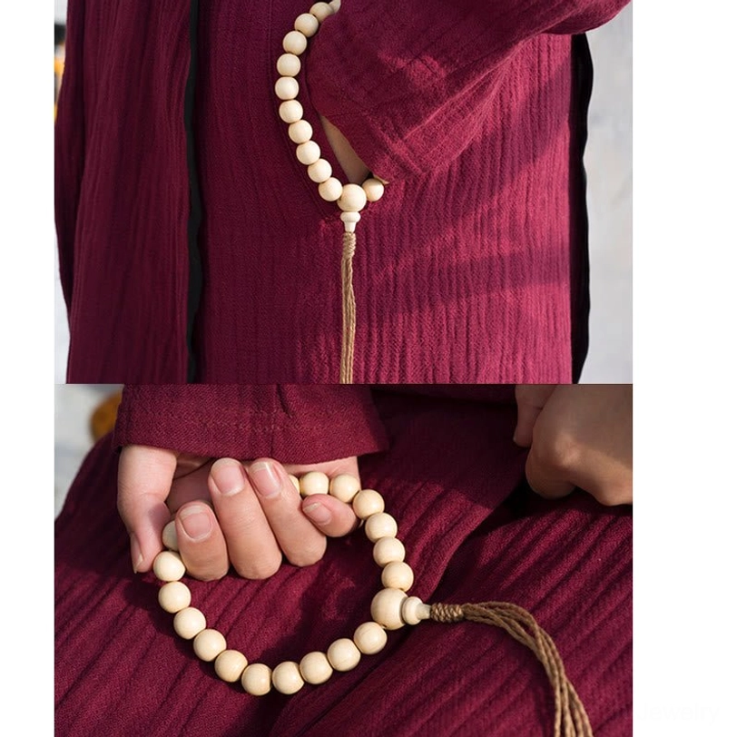 Abelia Biflora wood wrist mala bracelet stored on meditation altar with incense, candles, and spiritual accessories showing sacred placement