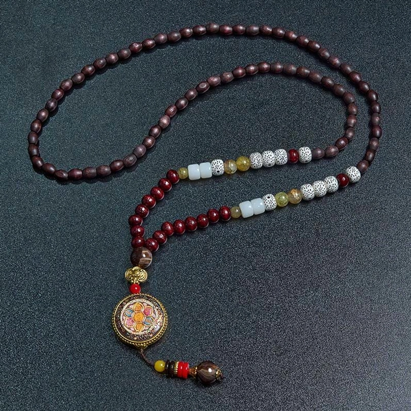 Tibetan wooden mala necklace with enamel Buddha pendant and decorative tassel