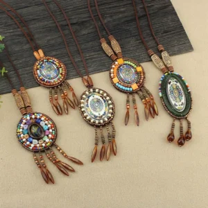 Collection of handcrafted Tibetan mandala beaded necklaces with multiple design styles displayed on natural wood backdrop