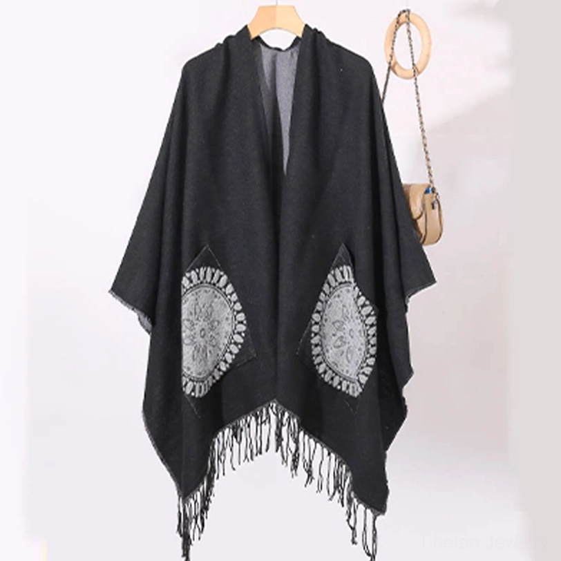 Tibetan mandala tassel shawl full-length flat lay display