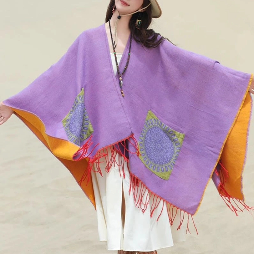 Orchid mandala shawl with tassel fringe draped view