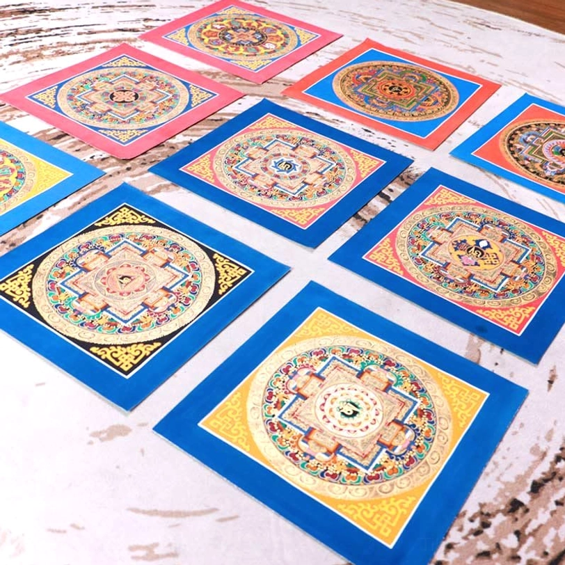 Tibetan mandala thangka with vibrant colors showing traditional Buddhist iconography and geometric patterns