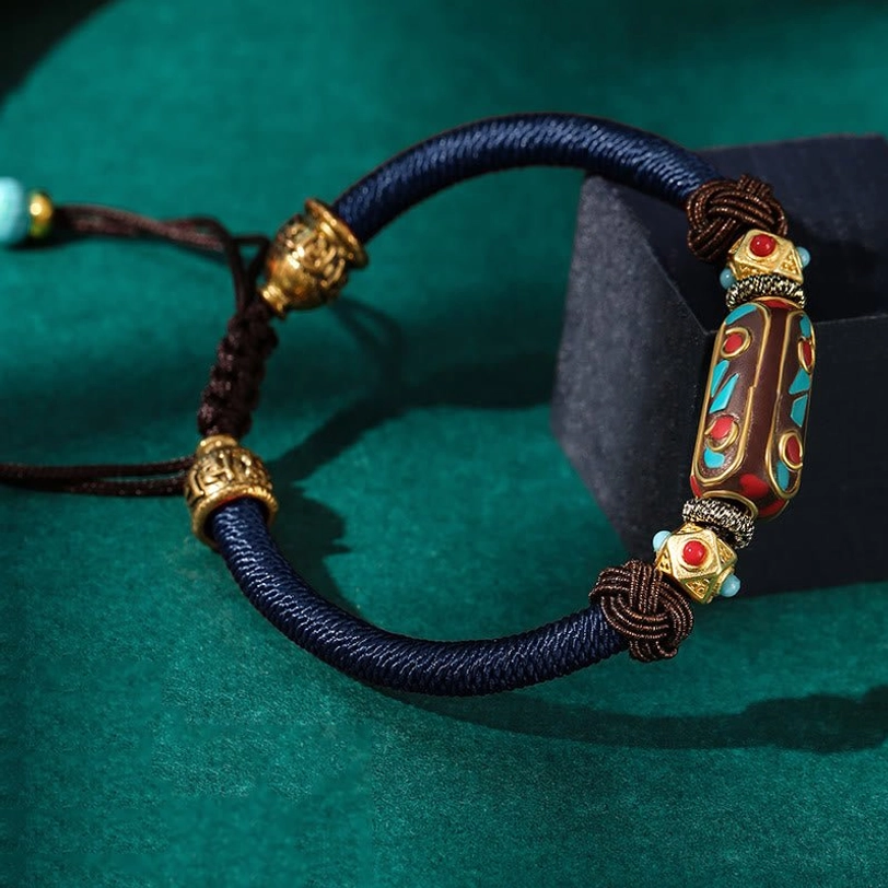 Blue Tibetan Om Mani Padme Hum braided bracelet variant with turquoise beads and adjustable pull cord