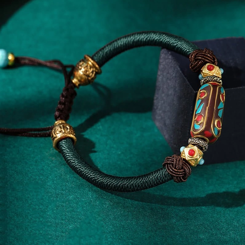 Dark green Tibetan Om Mani Padme Hum braided bracelet variant with turquoise beads and copper fittings