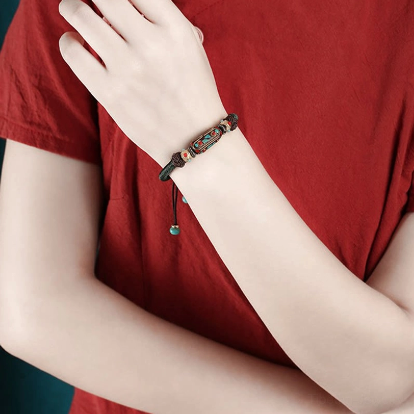 Deep blue Tibetan Om Mani Padme Hum braided bracelet with turquoise stones and vintage copper decorative elements