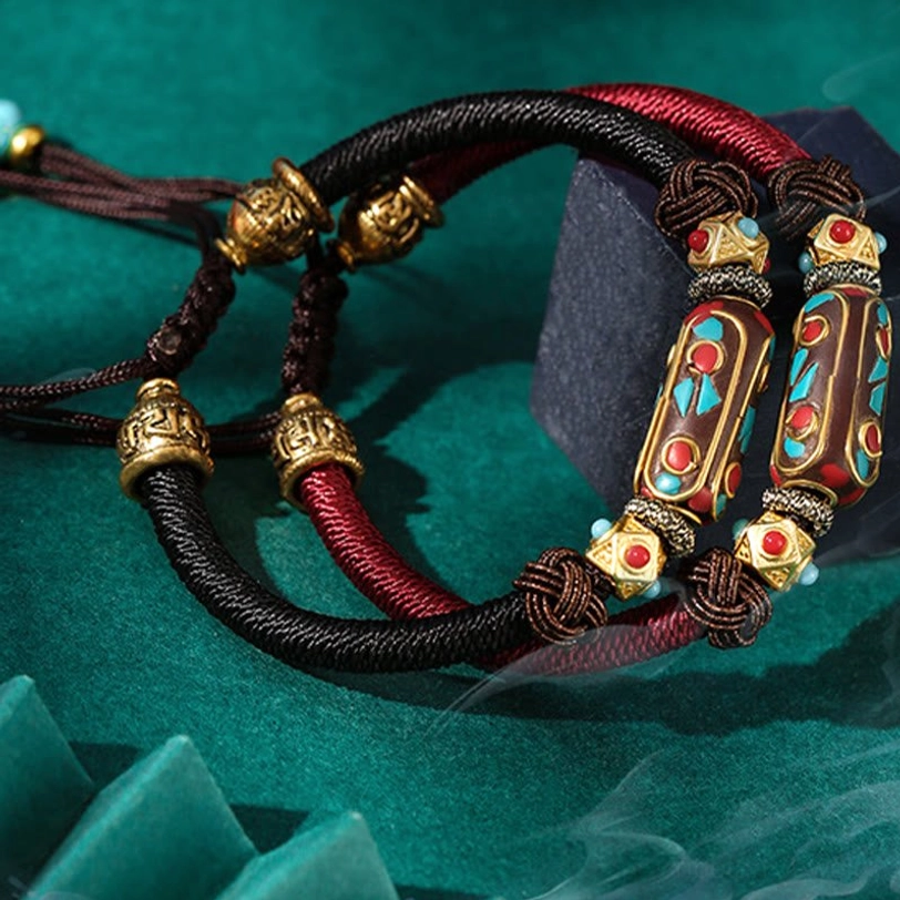 Tibetan Om Mani Padme Hum bracelet detail shot highlighting copper fittings and turquoise stone placement
