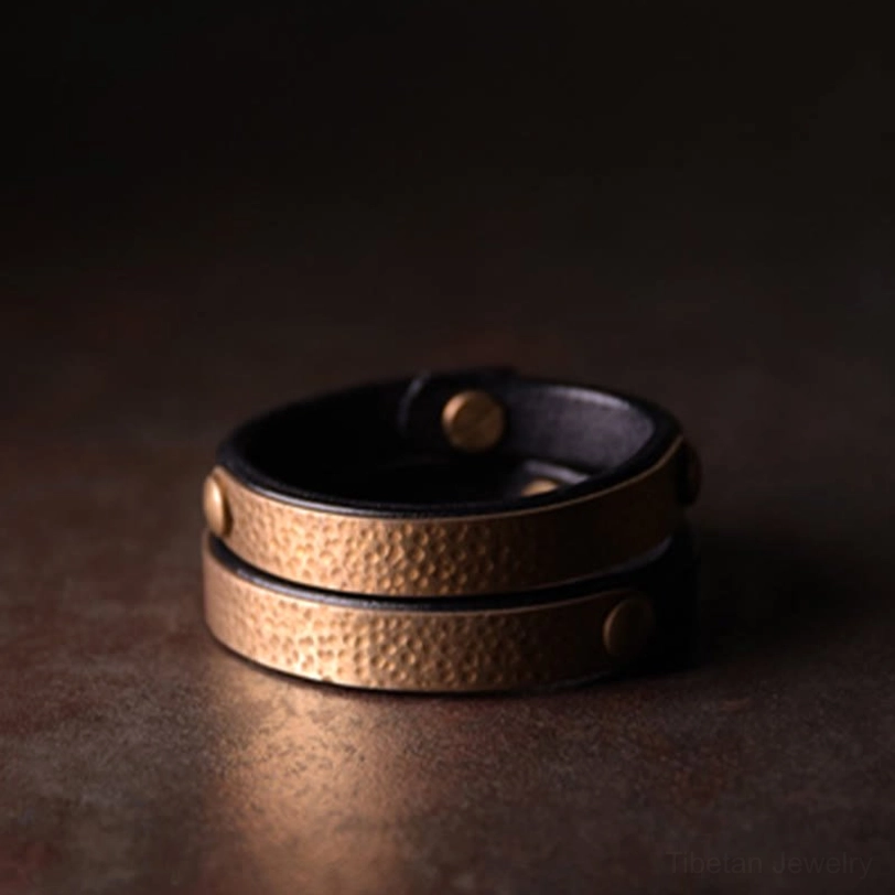 Handcrafted Tibetan copper brass bangle for manifesting wealth and attracting good fortune in daily spiritual practice