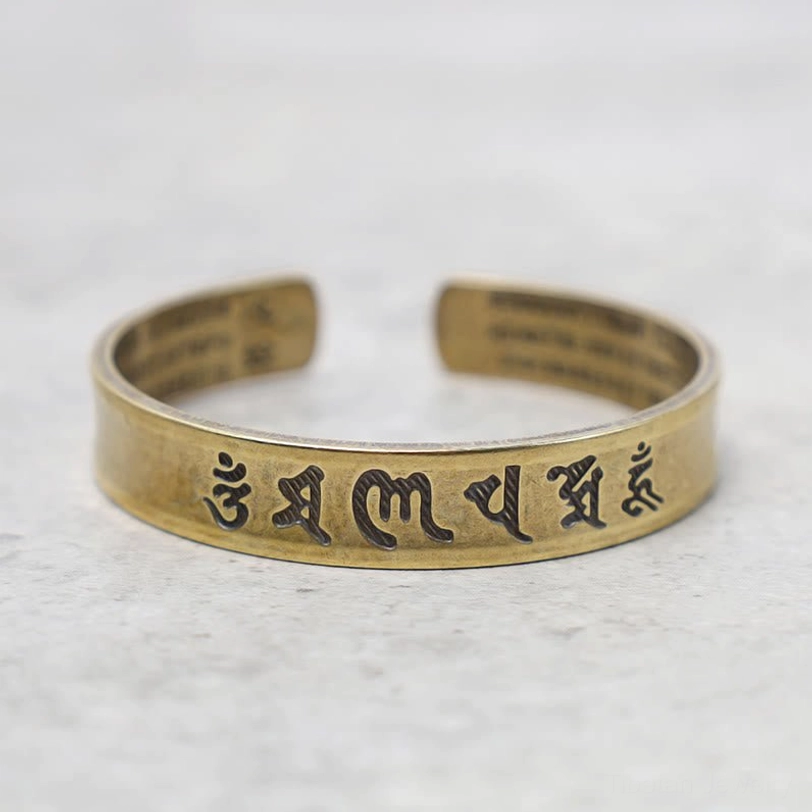 Tibetan Om Mani Padme Hum mantra brass bracelet front view with engraved six-word mantra