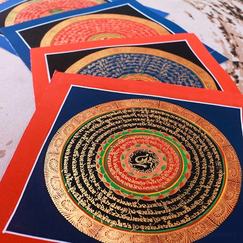 Tibetan mantra mandala thangka with black background, red border, and concentric Sanskrit gilt patterns