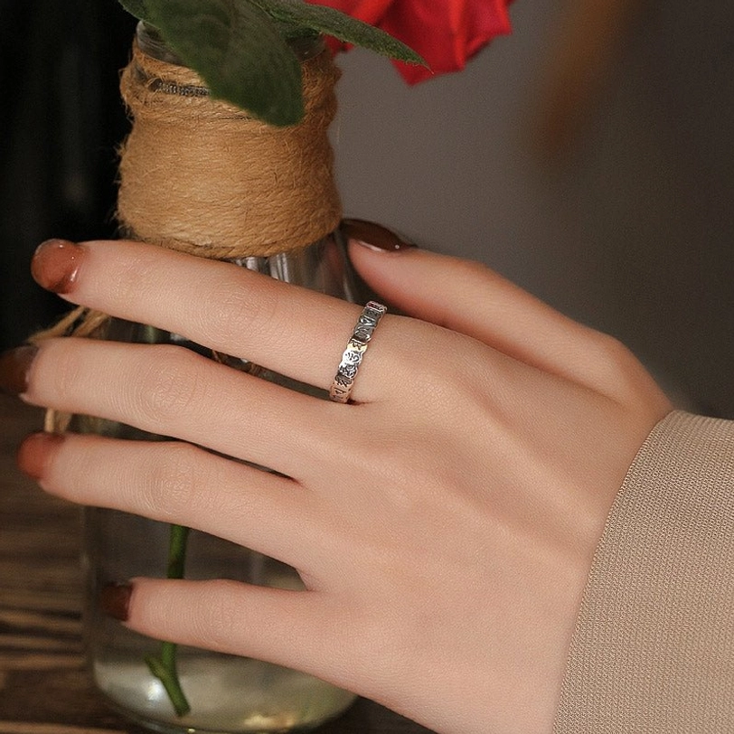 Tibetan protection ring silver band styled on hand, elegant daily wear spiritual jewelry for mindfulness and compassion
