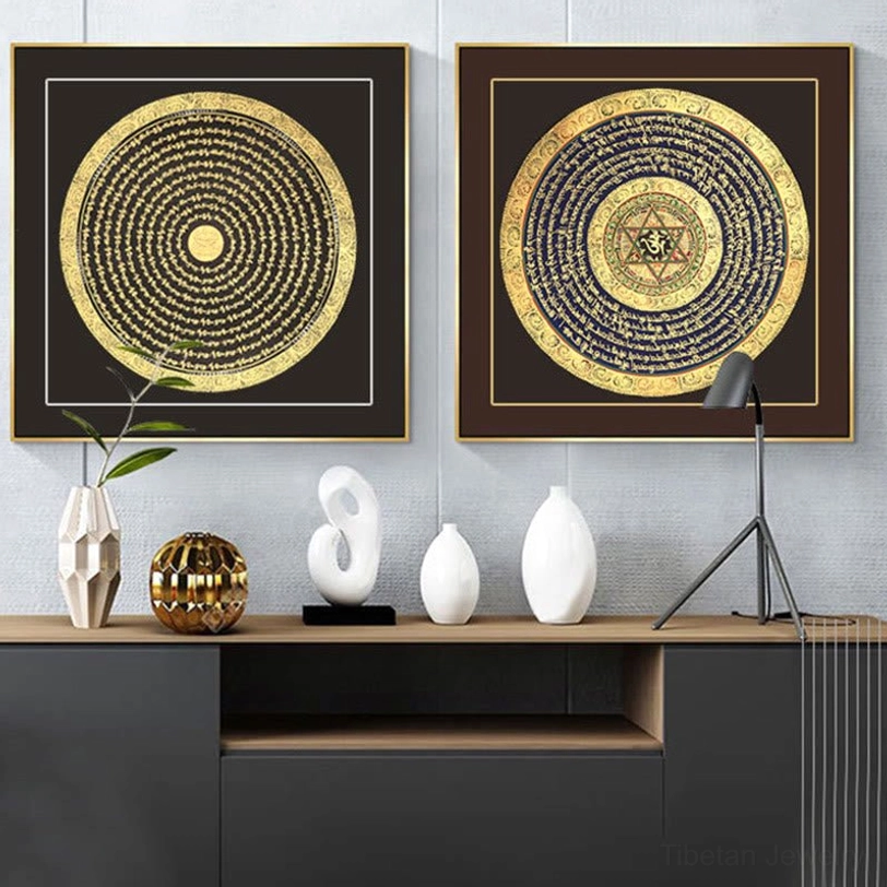 Circular Tibetan mantra thangkas displayed above console table with black and brown frames showing contrasting gold and blue-gold hand-painted designs