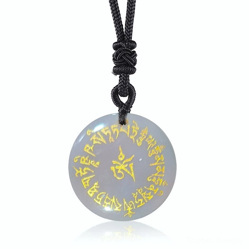 White Crystal Tibetan mantra pendant with translucent clear quartz stone and gold Sanskrit engraving