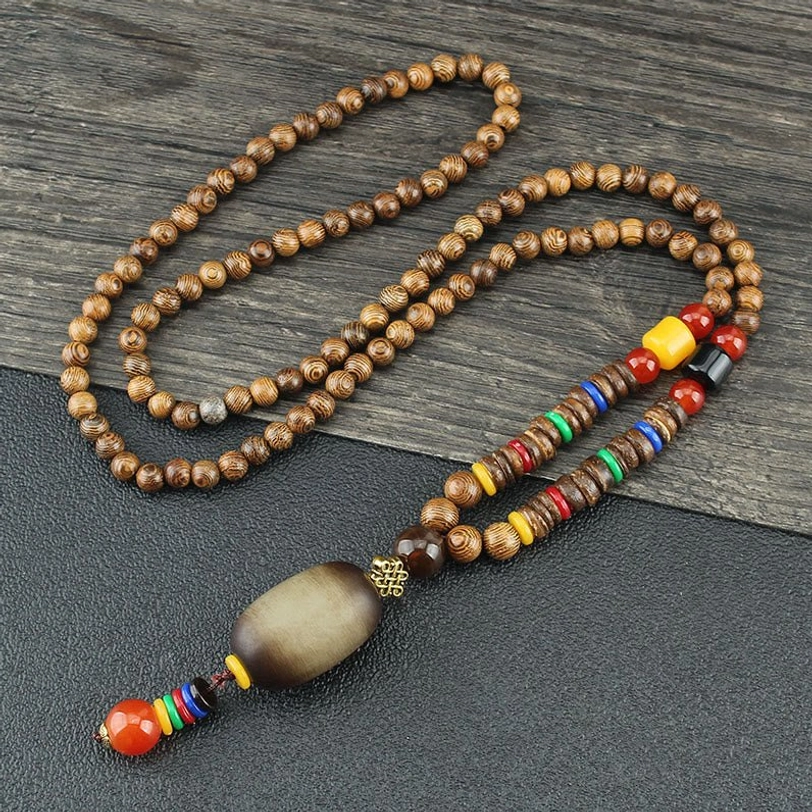 Multi-layer tibetan wooden bead necklace with matte oval pendant and colorful tail tassel, ethnic design