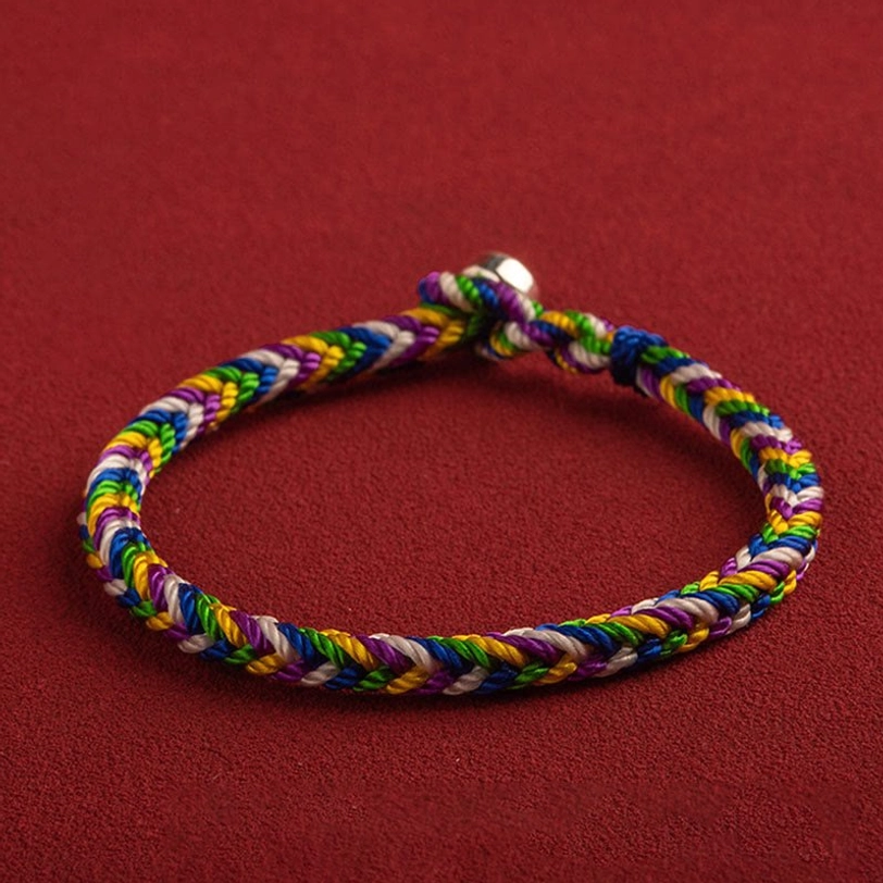 Five-color woven Tibetan protection bracelet with silver metal clasp, neatly braided rope pattern