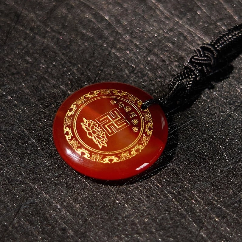 Tibetan necklace pendant showing hand-braided rope and stone pendant together