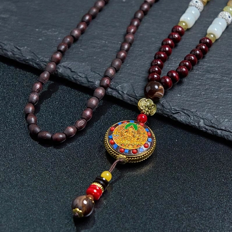 Authentic Tibetan Buddhist wood bead necklace with crescent metal spacer and enamel pendant