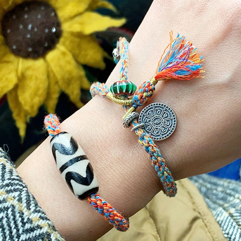 Tibetan Nine-Eye Dzi bead Om Mani Padme Hum sterling silver protection bracelet detail of hand-painted bead pattern