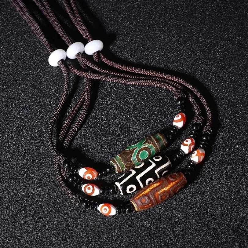 Tibetan nine-eye dzi bead necklace - authentic protective amulet with natural agate stone and traditional cord