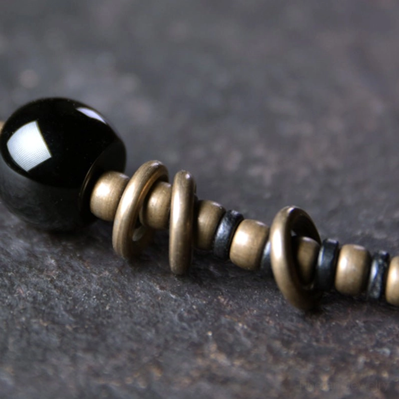 Tibetan Dzi bead nine-eye protection bracelet with authentic hand-painted beads and spiritual symbolism