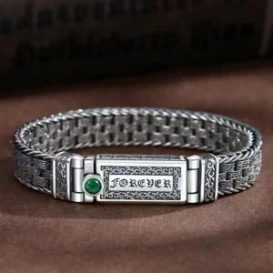 Tibetan Om Mani Padme Hum copper bracelet with Tang Dynasty floral design, front flat lay view showing the complete braided chain and ornamental details