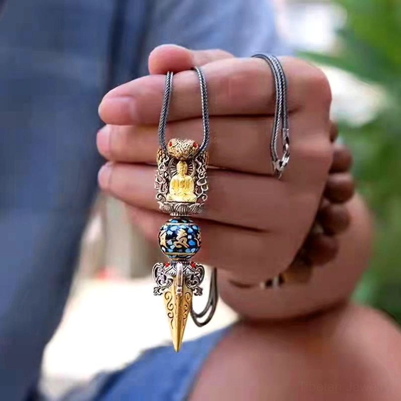 Tibetan Buddhist spiritual necklace worn outdoors showing full Om Mani Padme Hum pendant with matching metal chain and authentic mantra design