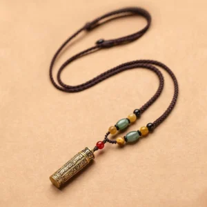 Tibetan Om Mani Padme Hum agate protection necklace pendant with engraved brass cylinder and multi-color gemstone beads