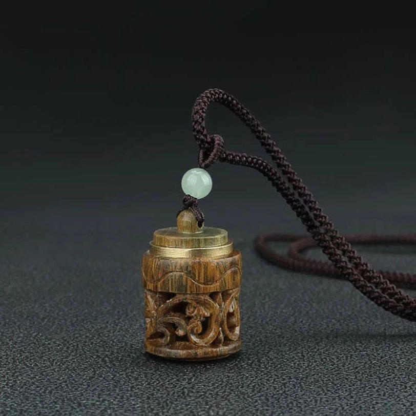 Tibetan green sandalwood Om Mani Padme Hum mantra necklace pendant, symbol of Buddhist compassion and enlightenment
