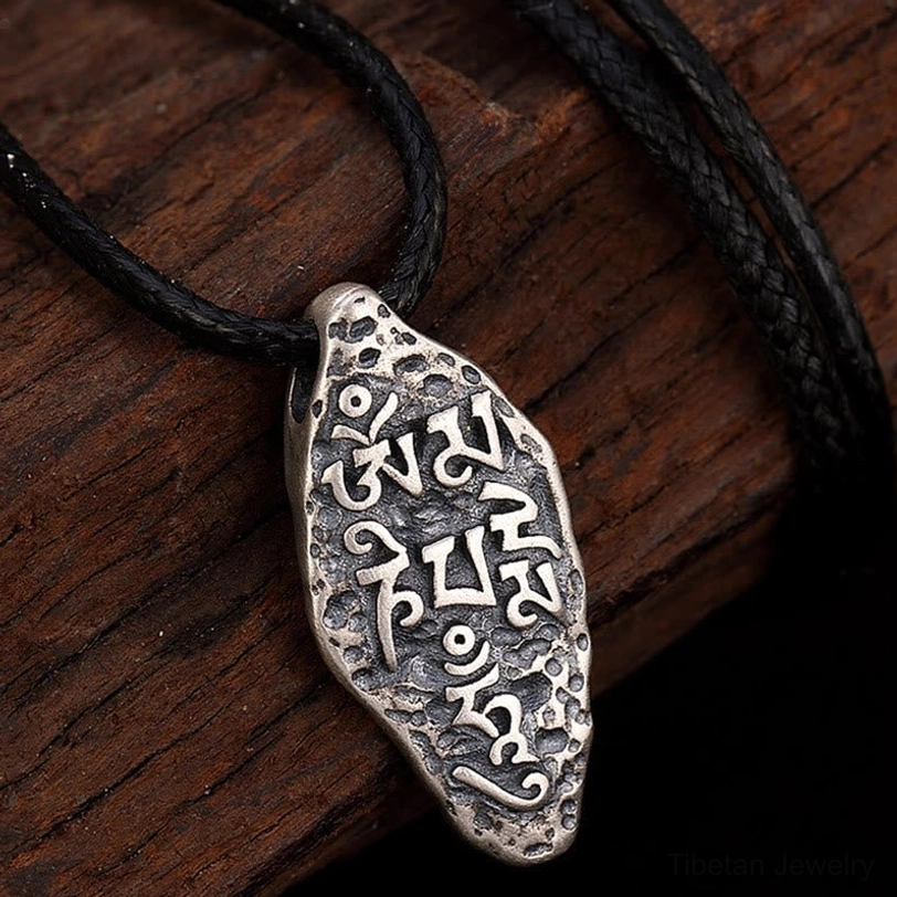 Handcrafted Tibetan Buddhist Om Mani Padme Hum sterling silver necklace pendant collection display