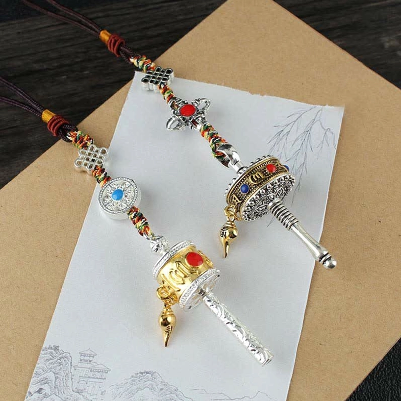 Tibetan Om Mani Padme Hum prayer wheel car hanging decoration with rotating wheel design and spiritual protection energy