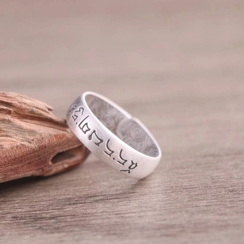 sterling silver tibetan blessing ring featuring om mani padme hum sacred mantra engraving
