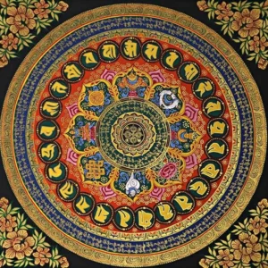 Tibetan Om Mani Padme Hum colorful mandala thangka painting with gold gilded borders and floral corner accents, overhead flat lay view