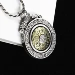 Tibetan om mani padme hum rotatable double vajra pendant necklace with fretwork design and two-tone finish