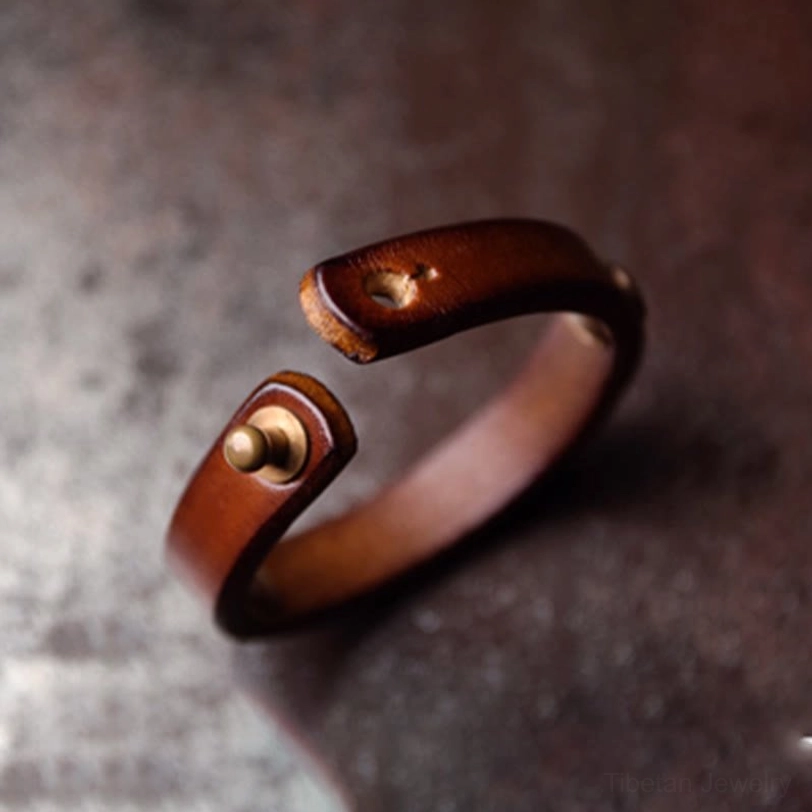 Open-ended Tibetan leather cuff bracelet with brass stud fasteners, slip-on wearable style for prosperity and protection