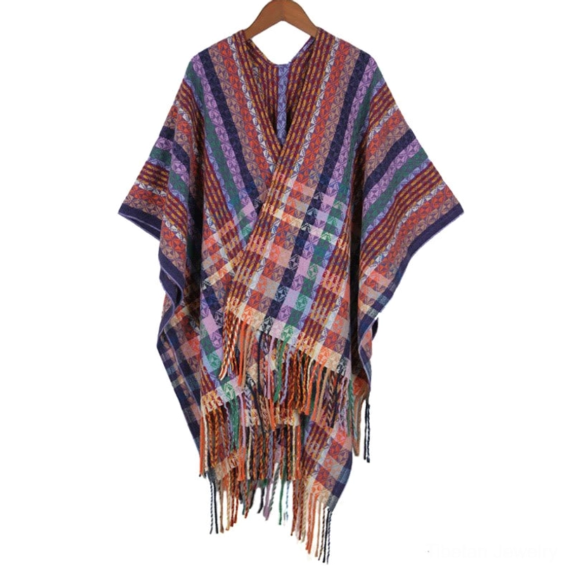 Tibetan striped wrap shawl in orchid color showing vibrant geometric design and traditional fringed tassel hem