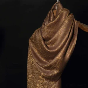 Tibetan jacquard paisley shawl with tassel fringe - brown warm tones close-up view