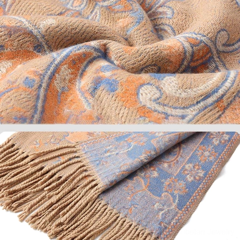Beige Tibetan tassel shawl flat display showing full paisley pattern and cream tone traditional motif