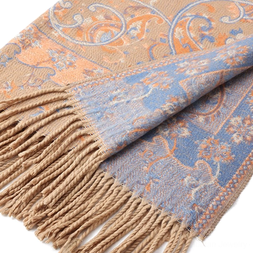 Beige Tibetan paisley tassel shawl side-angle view showing jacquard weave texture and traditional fringe detail