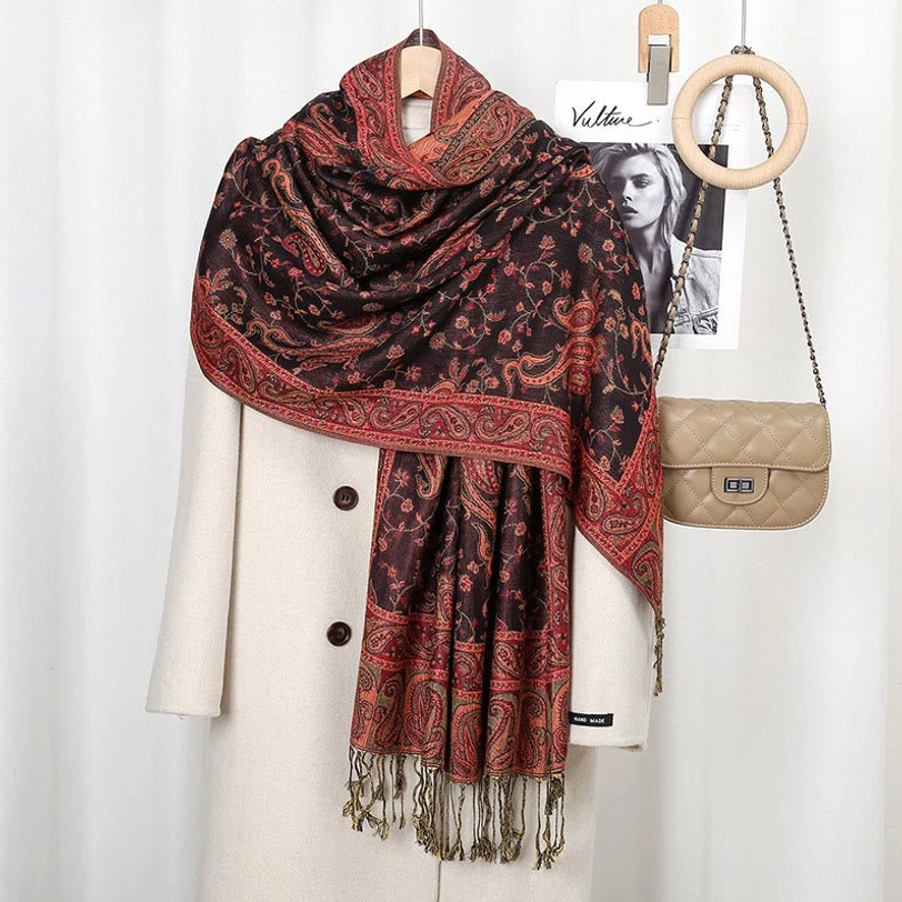Tibetan paisley shawl in warm brown red tone showing full design and soft woven fabric quality