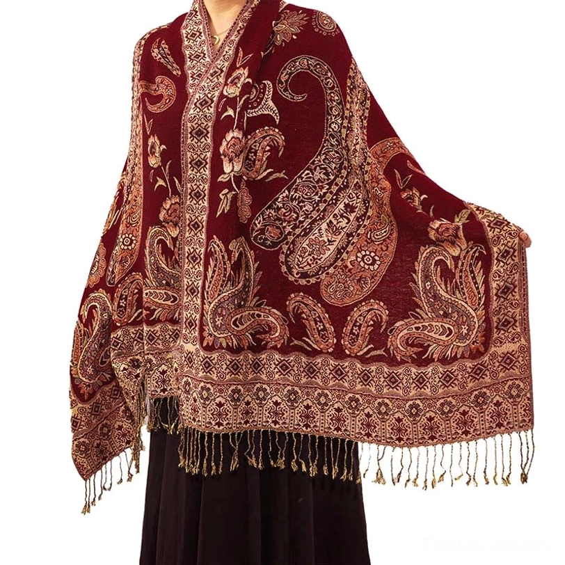 Tibetan bohemian shawl burgundy color variant front view on model with golden-brown paisley prints and fringe hem