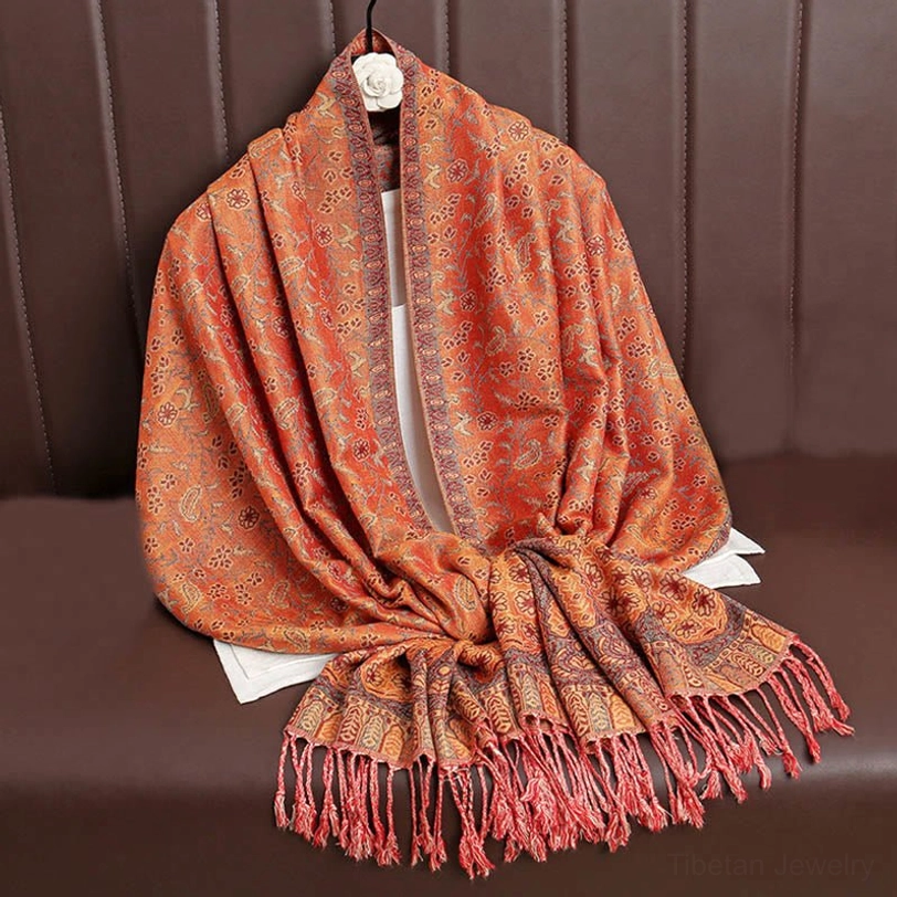 Tibetan handwoven jacquard paisley tassel shawl in multiple color variations showing the full range of available jewel tones and design options