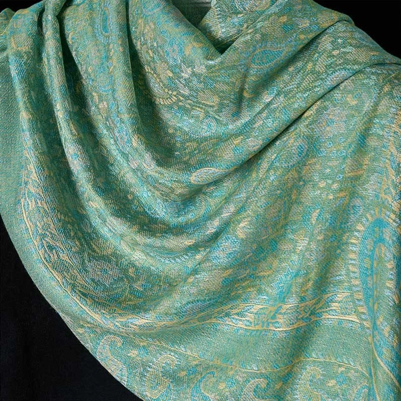 Tibetan paisley shawl product display, showing color variations and versatile styling options