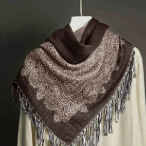 Dark brown and beige paisley jacquard tassel shawl displayed flat from overhead showing full jacquard pattern and fringed edges