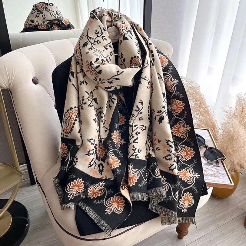 Tibetan paisley shawl with dark gray base and intricate floral design in traditional style