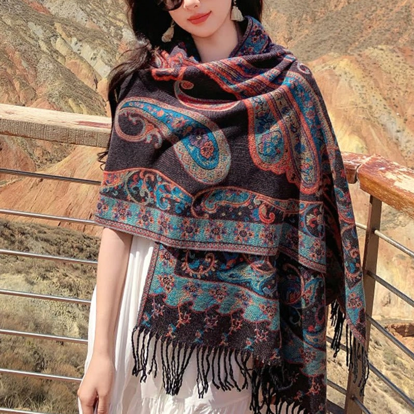 Dark Magenta Tibetan tassel shawl close-up showing deep color richness and fine paisley weave pattern