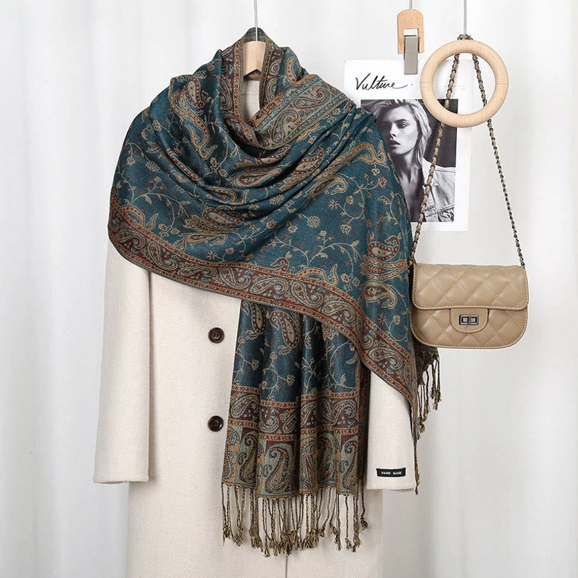 Tibetan cashew flower paisley shawl in rich dark red showing warm tones and complete decorative pattern