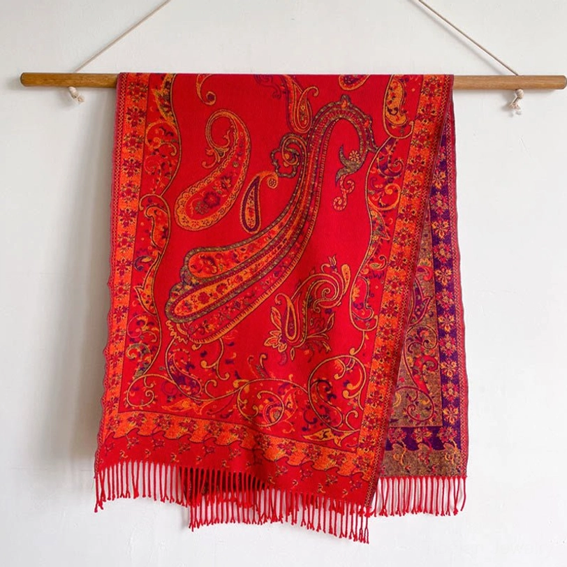 Dark Sea Green Tibetan tassel shawl hanging display showing complete paisley motifs and double-sided fringe hem