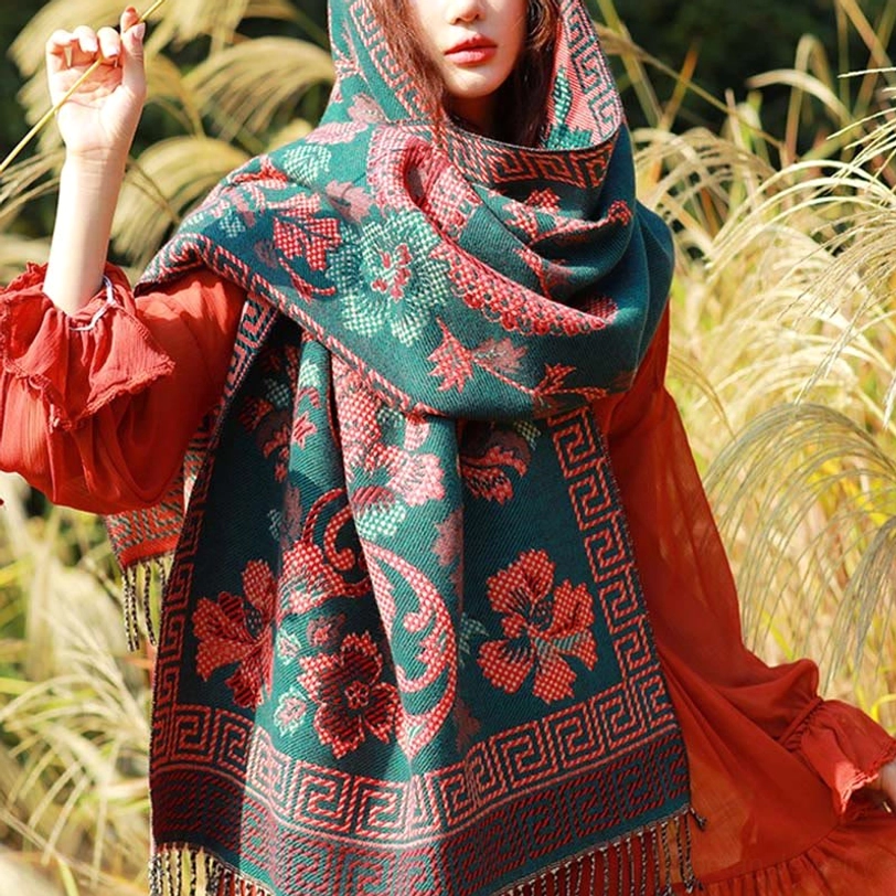 Dark cyan Tibetan floral paisley shawl with handcrafted jacquard weave detail in natural lighting