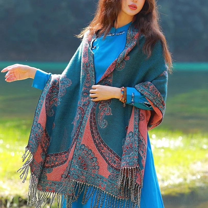Dark cyan Tibetan paisley shawl demonstrating cool color palette and sophisticated ethnic pattern aesthetic for modern wardrobes